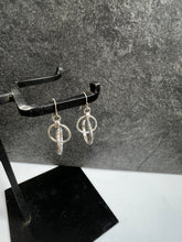 Abstract Interlocking-Hoops