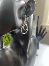 Abstract Interlocking-Hoops