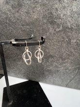 Abstract Interlocking-Hoops