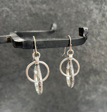 Abstract Interlocking-Hoops